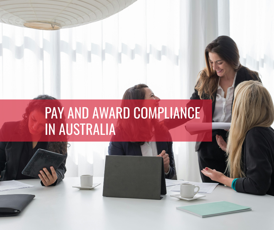 HR manager reviewing pay and award compliance documents in Australia
